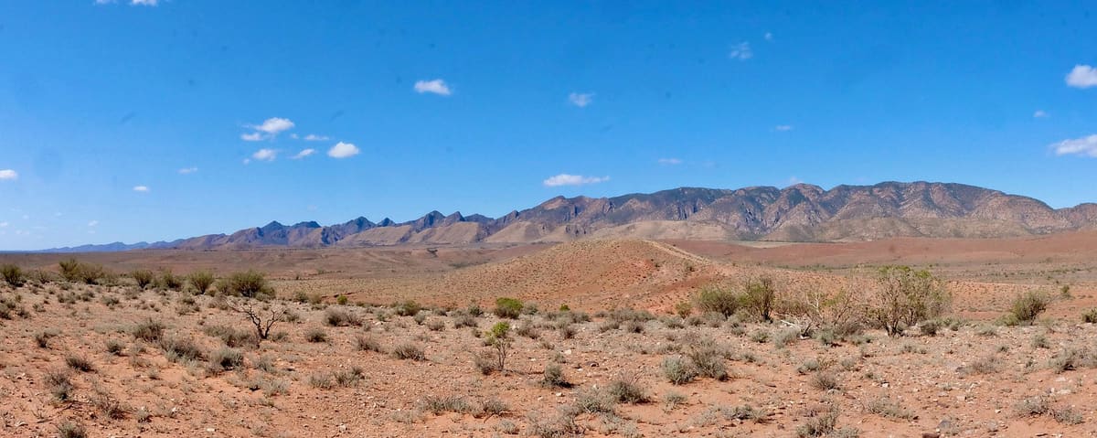 The Flinders Ranges extending north across open plains, viewed west of Brachina Gorge Road