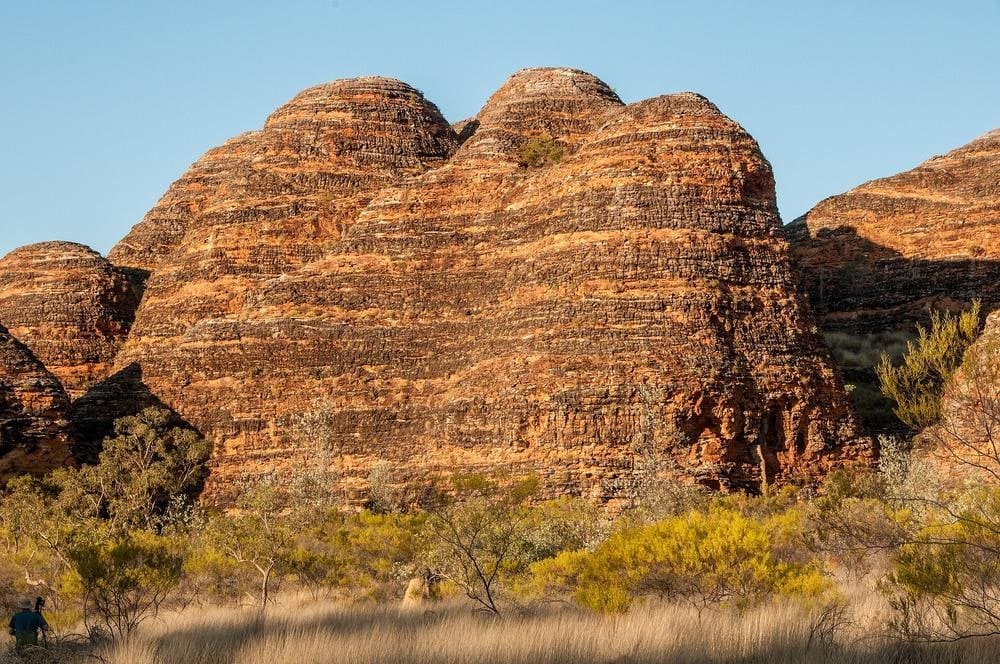 The formed track of the Domes Trail winding between beehive domes near the Piccaninny carpark in Purnululu National Park